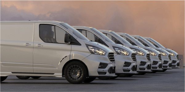 Six white work vans